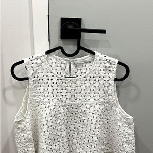 Sleeveless white top